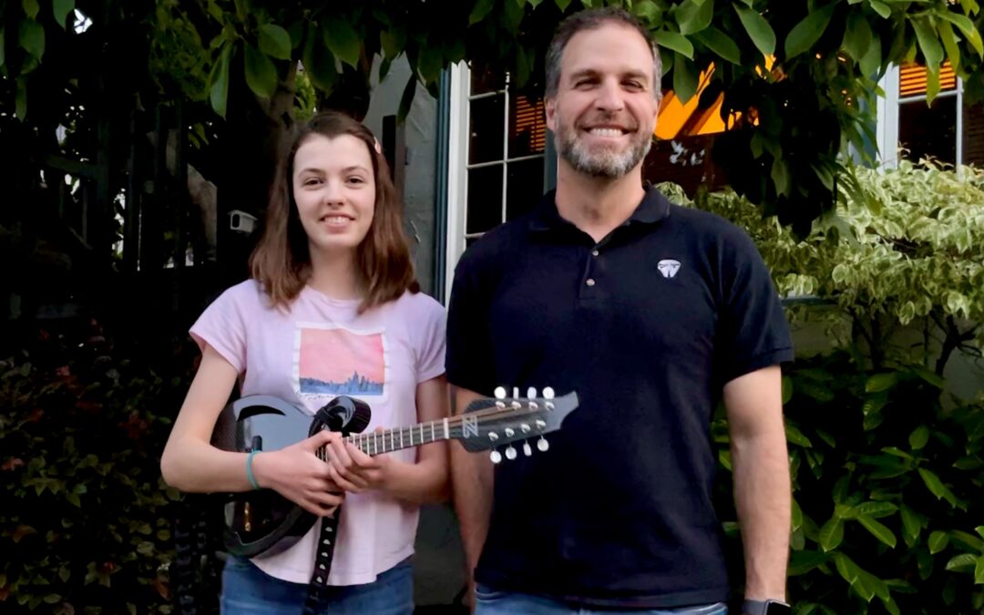 Nick Khadder wins first Strings for Dreams Bluegrass Raffle